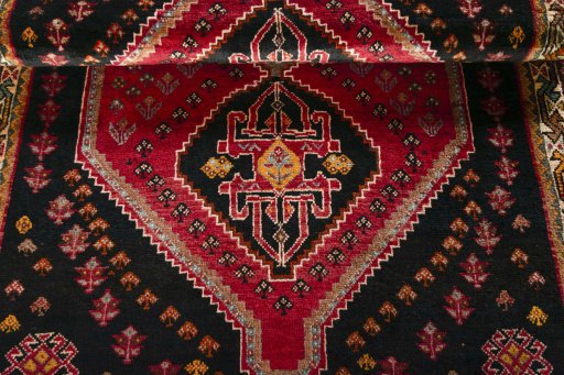 Full view of 2000s Shiraz rug from Iran / Persia, 162 × 120 cm in Red tones