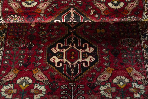 Full view of 2000s Shiraz rug from Iran / Persia, 154 × 108 cm in Red tones