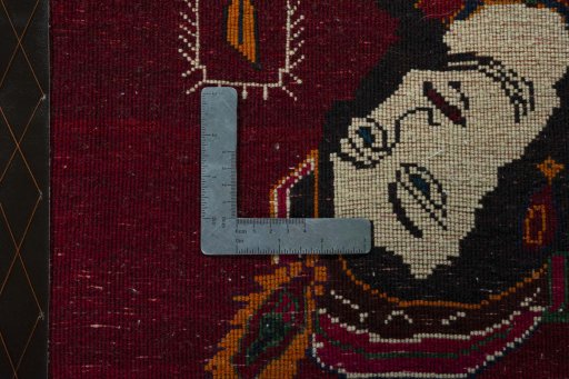 Backside of handmade 2000s Shiraz rug showing knot structure and weave density