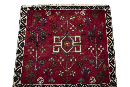 Surface texture of 2000s Shiraz rug with natural Wool and intricate pattern