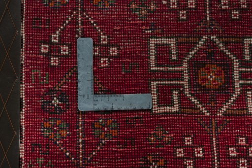 Backside of handmade 2000s Shiraz rug showing knot structure and weave density