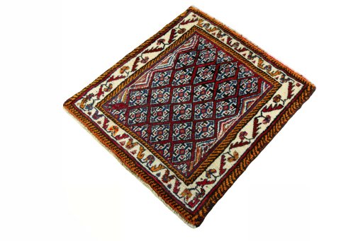 Corner detail of 2000s Shiraz rug showing border pattern and Wool pile