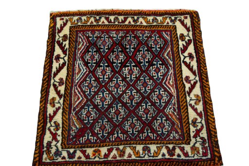 Surface texture of 2000s Shiraz rug with natural Wool and intricate pattern