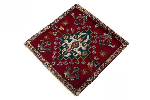 Corner detail of 2000s Shiraz rug showing border pattern and Wool pile