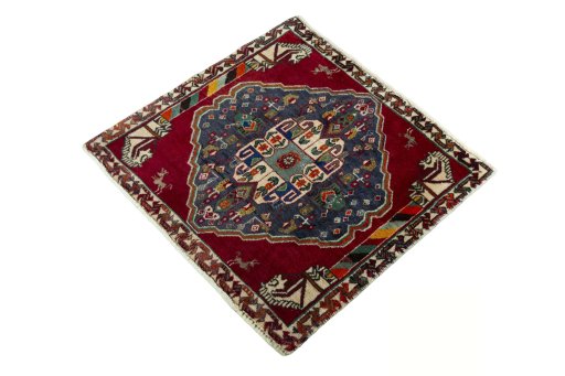 Corner detail of 2000s Shiraz rug showing border pattern and Wool pile