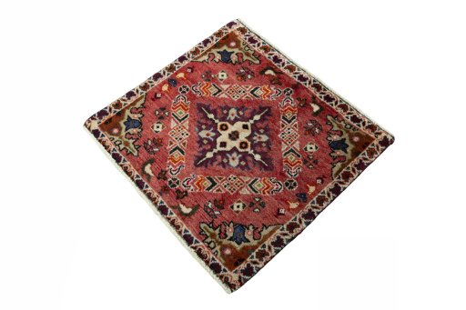Corner detail of 2000s Shiraz rug showing border pattern and Wool pile