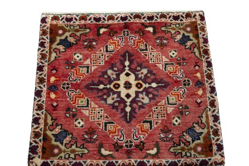 Surface texture of 2000s Shiraz rug with natural Wool and intricate pattern