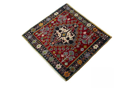 Corner detail of 2000s Shiraz rug showing border pattern and Wool pile