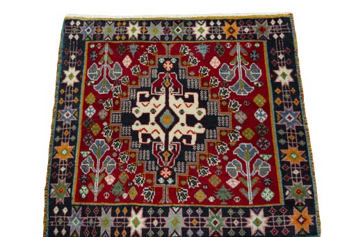 Surface texture of 2000s Shiraz rug with natural Wool and intricate pattern