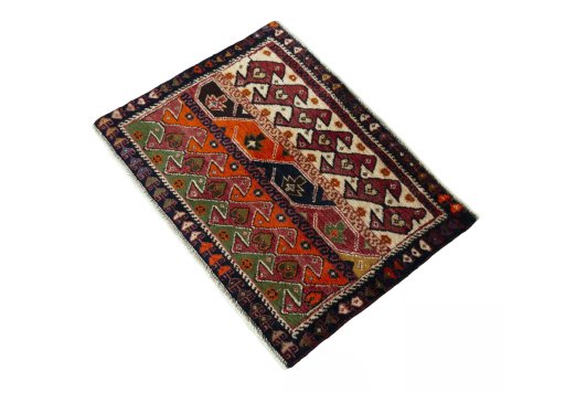 Corner detail of 2000s Shiraz rug showing border pattern and Wool pile