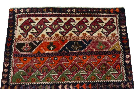 Surface texture of 2000s Shiraz rug with natural Wool and intricate pattern