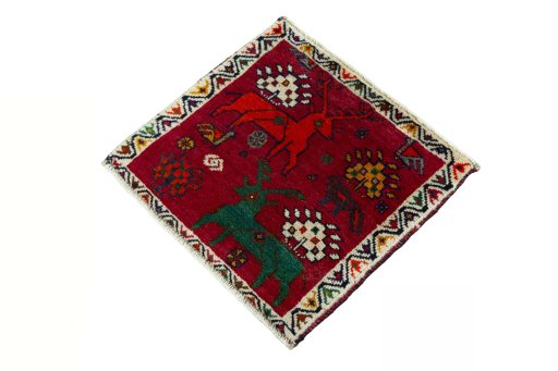 Corner detail of 2000s Shiraz rug showing border pattern and Wool pile