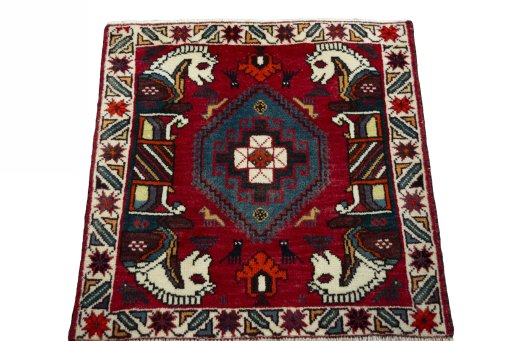 Surface texture of 2000s Shiraz rug with natural Wool and intricate pattern