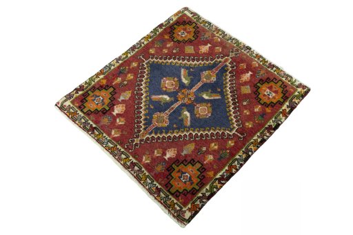 Corner detail of 2000s Shiraz rug showing border pattern and Wool pile