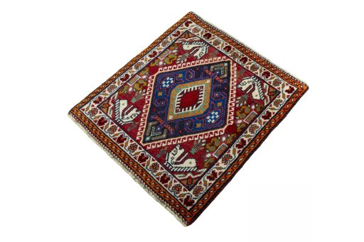 Corner detail of 2000s Shiraz rug showing border pattern and Wool pile