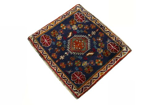 Corner detail of 2000s Shiraz rug showing border pattern and Wool pile