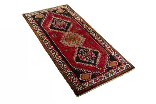 Close-up detail of 2000s Shiraz rug from Iran / Persia showing Wool weave