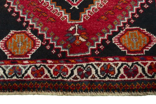 Central medallion detail of 2000s Shiraz rug from Iran / Persia