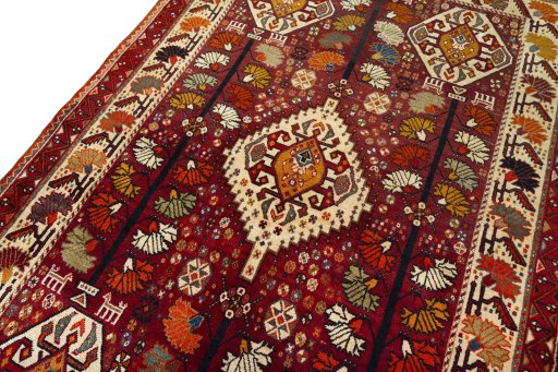 Backside of handmade 2000s Shiraz rug showing knot structure and weave density