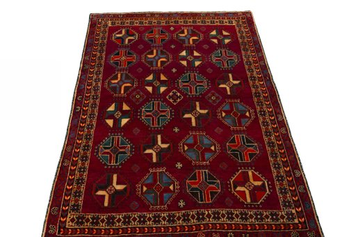 Surface texture of 2000s Shiraz rug with natural Wool and intricate pattern