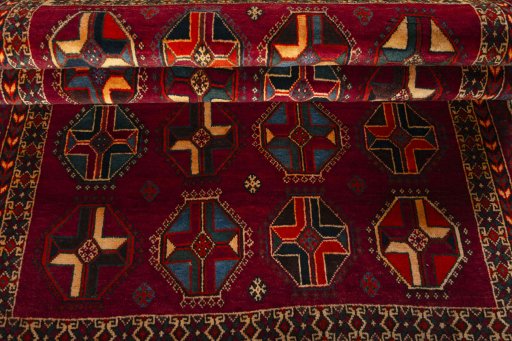 Full view of 2000s Shiraz rug from Iran / Persia, 207 × 132 cm in Red tones