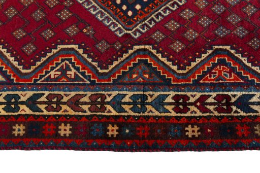 Close-up detail of 2000s Shiraz rug from Iran / Persia showing Wool weave