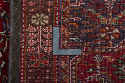 Surface texture of 2000s Shiraz rug with natural Wool and intricate pattern