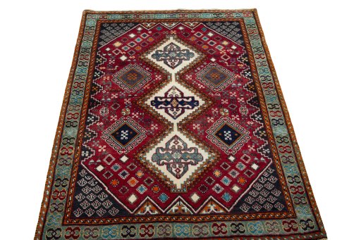 Surface texture of 2000s Shiraz rug with natural Wool and intricate pattern