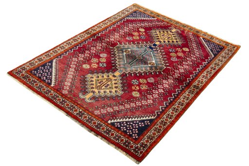 Corner detail of 2000s Shiraz rug showing border pattern and Wool pile