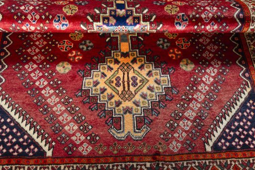 Full view of 2000s Shiraz rug from Iran / Persia, 203 × 150 cm in Red tones