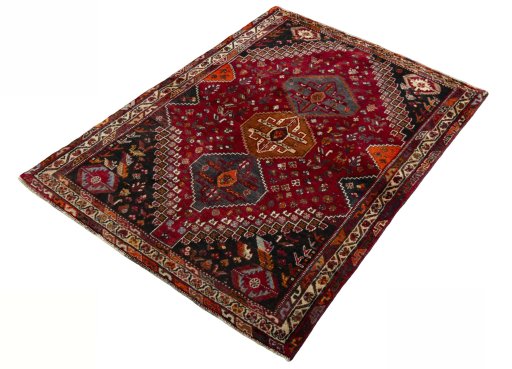 Corner detail of 2000s Shiraz rug showing border pattern and Wool pile