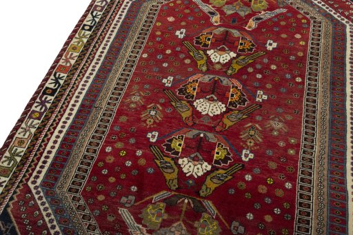 Backside of handmade 2000s Shiraz rug showing knot structure and weave density