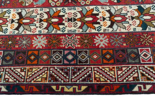Close-up detail of 2000s Shiraz rug from Iran / Persia showing Wool weave