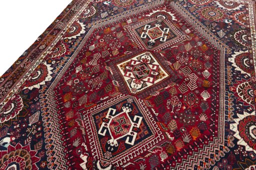 Backside of handmade 2000s Shiraz rug showing knot structure and weave density