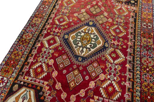 Backside of handmade New Shiraz rug showing knot structure and weave density