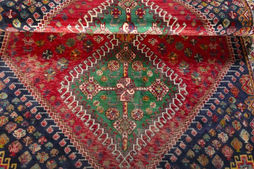 Full view of 2000s Shiraz rug from Iran / Persia, 175 × 120 cm in Red tones