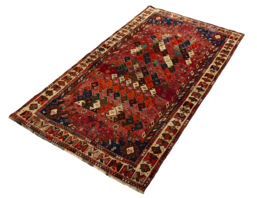 Corner detail of 2000s Shiraz rug showing border pattern and Wool pile