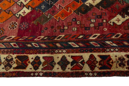 Close-up detail of 2000s Shiraz rug from Iran / Persia showing Wool weave