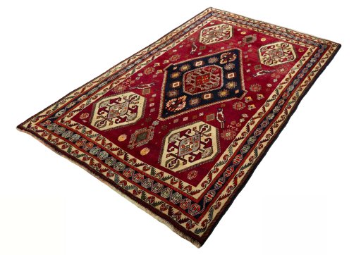 Corner detail of 2000s Shiraz rug showing border pattern and Wool pile