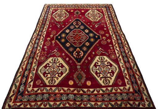Surface texture of 2000s Shiraz rug with natural Wool and intricate pattern