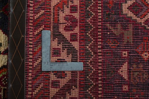 Surface texture of 2000s Shiraz rug with natural Wool and intricate pattern