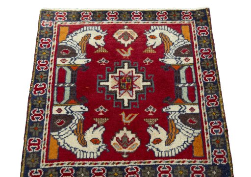 Surface texture of 2000s Shiraz rug with natural Wool and intricate pattern