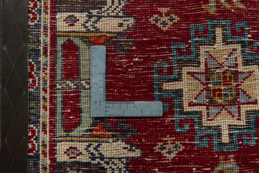 Backside of handmade 2000s Shiraz rug showing knot structure and weave density