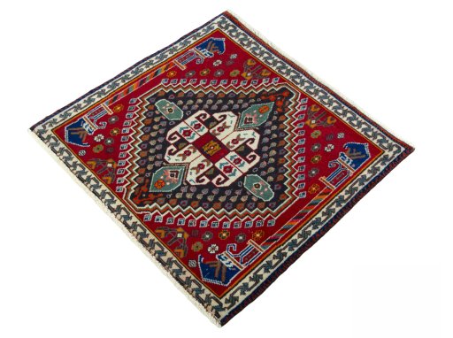 Corner detail of 2000s Shiraz rug showing border pattern and Wool pile