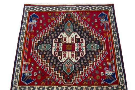 Surface texture of 2000s Shiraz rug with natural Wool and intricate pattern