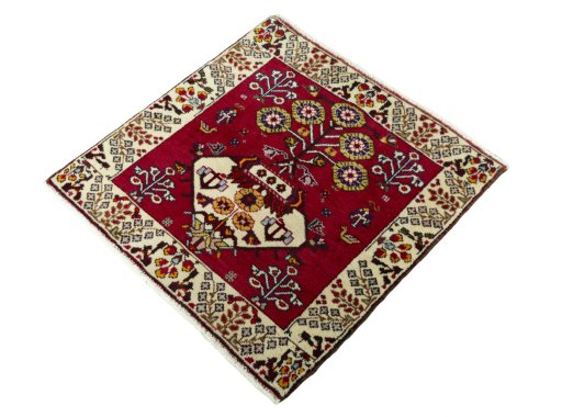 Corner detail of 2000s Shiraz rug showing border pattern and Wool pile