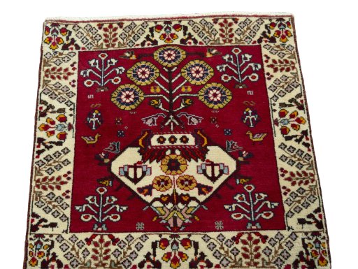 Surface texture of 2000s Shiraz rug with natural Wool and intricate pattern