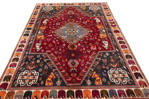 Surface texture of 2000s Shiraz rug with natural Wool and intricate pattern