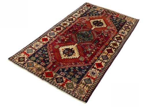 Corner detail of 2000s Shiraz rug showing border pattern and Wool pile