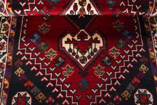 Full view of 2000s Shiraz rug from Iran / Persia, 140 × 86 cm in Red tones